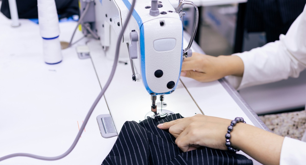 Tailor with sowing machine