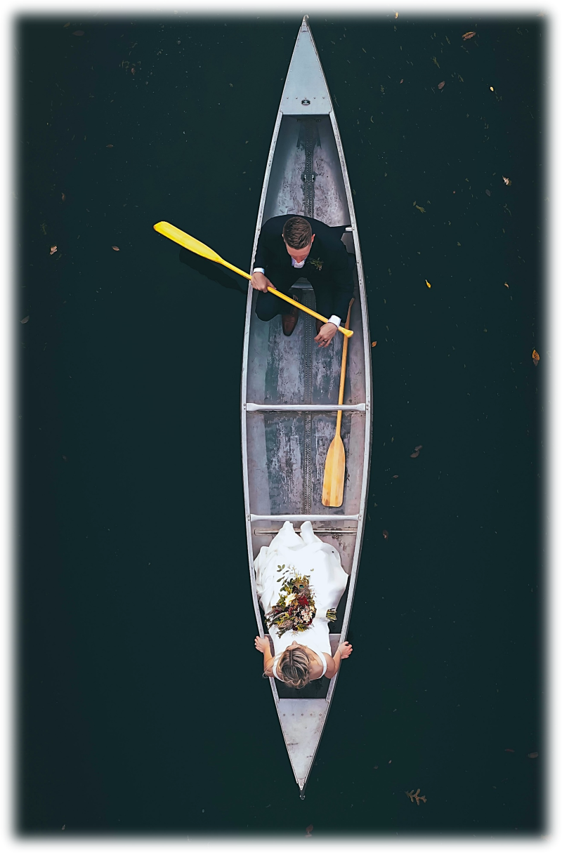 Bride and groom in a canoe