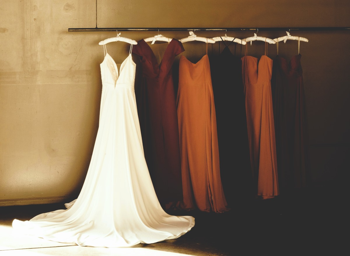 Several bridal dresses on a rack