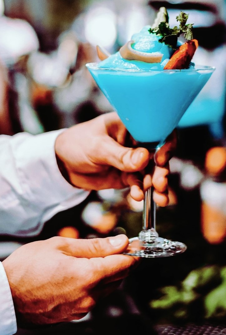 People toasting with wine glasses