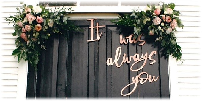 Sign hung at the door that reads 'It was always you'